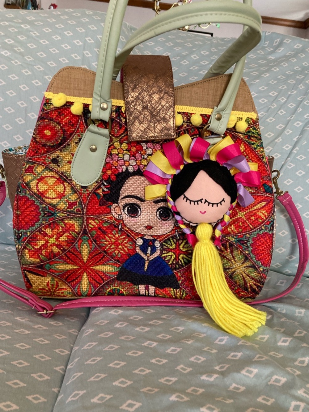 FRIDA KALHO Embroidered Tote in colorful print 
Doll hang tag. Zipper closure